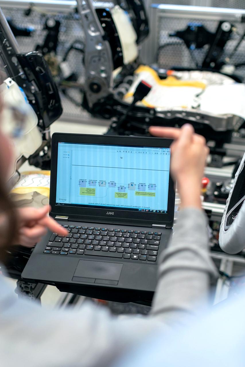 Engineer analyzing turbocharger data